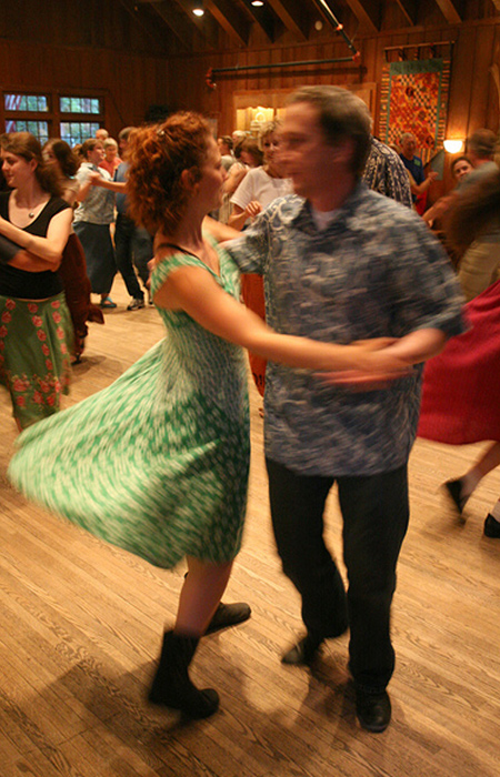 Annie Fain and Robert Forsyth dancing in the Community Room
