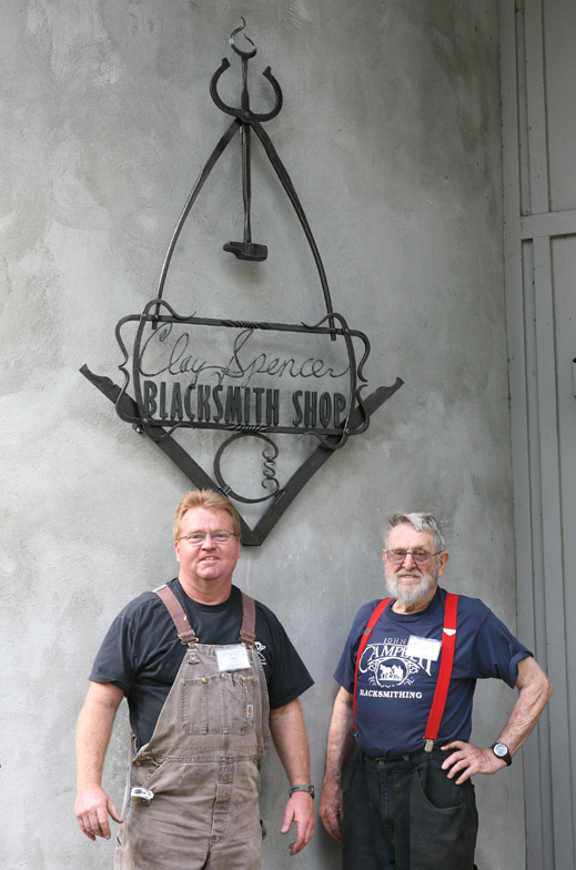 Matt Jenkins (left), standing next to Clay Spencer in front of the new sign. Matt designed the Clay Spencer Sign. 