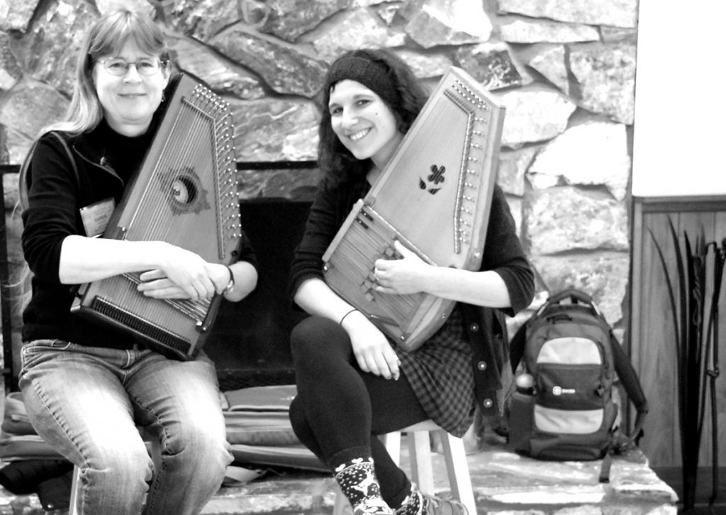 As a host at the Folk School, sometimes really incredible opportunities come your way. Karen Mueller is an innovative, virtuosic musician and highly sought after music educator. I recently took Karen Mueller’s intermediate-advanced autoharp class and weekend beginner mountain dulcimer class back-to-back. At the end of our time together, she agreed to sit down with me and answer a few of my questions about her life, career, and relationship to the Folk School.    ...