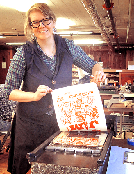 Yours truly, Cory Marie, pulling a poster print in Jim's poster making class
