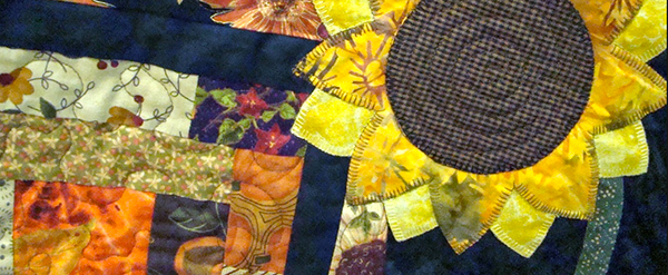 Detail of "It's Fall, Y'all: Fun Scrappy Autumn Quilt" by Audrey Hiers