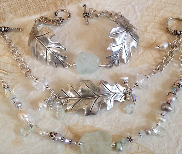 Jewelry pieces by Leanne Ewert of Triskele Moon Studios