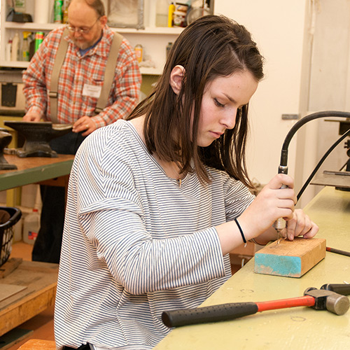 Hannah works on a jewelry project in Tom & Kay Patterson's class, "Mechanical Connections." 