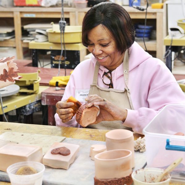 Constructing a mini clay pot