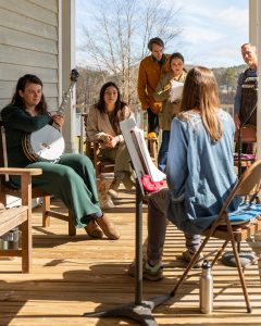 Playing music and singing songs on the porch Playing music and singing songs on the porch