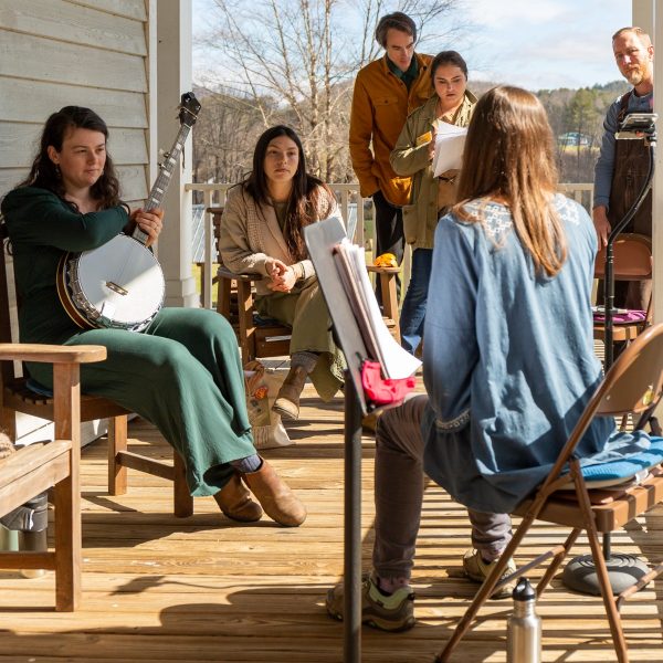 Playing music and singing songs on the porch