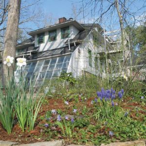 Left side of Keith House, displaying greenhouse