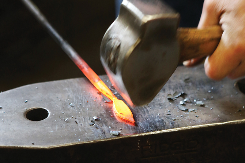 Blacksmithing Hammering hot metal