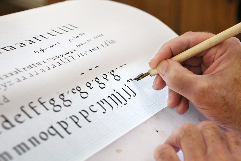 A student practicing calligraphy