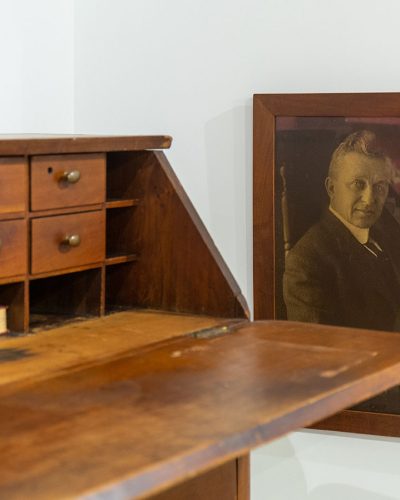 Portrait of John C. Campbell and desk