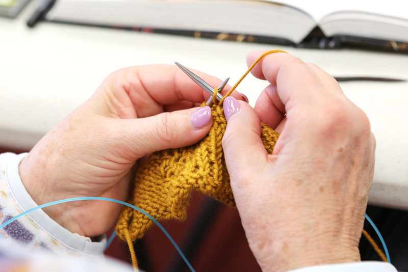 Image of woman knitting