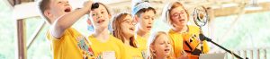 Little Middle students singing on the Festival Barn stage