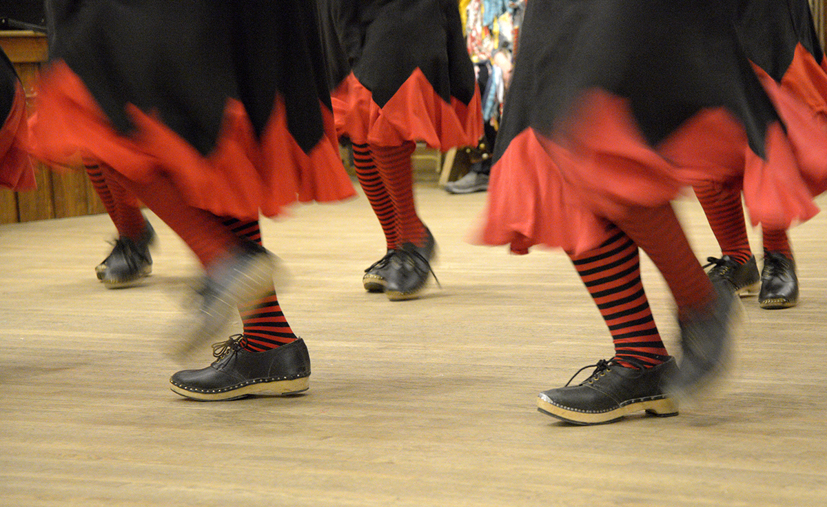 A photo of the Dame's Rockets shoes while the dance team performs.