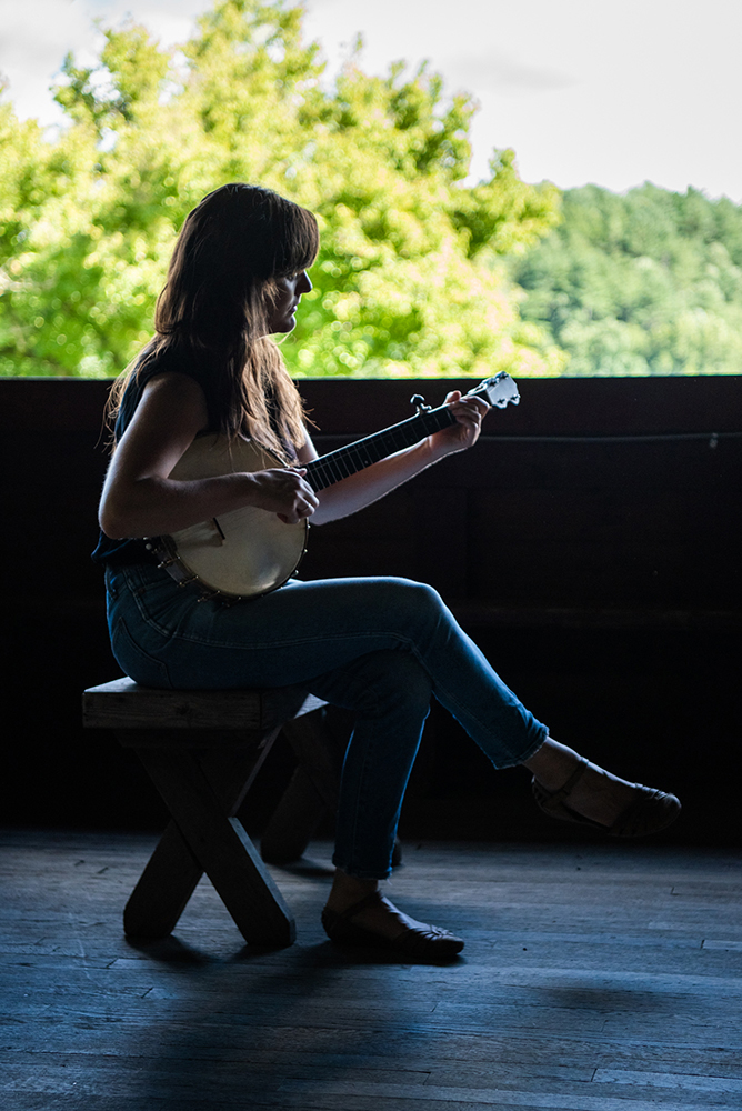 Becky Hill playing banjo in Open House at the Folk School.