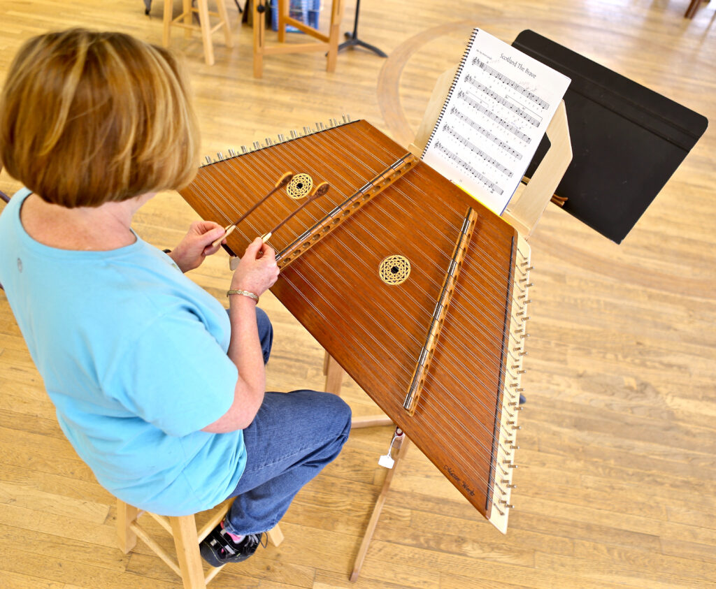 Practicing some new techniques on a hammered dulcimer