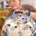 Janet Working on a Stained glass lamp