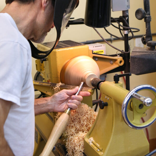 Turning a bowl for the first time.