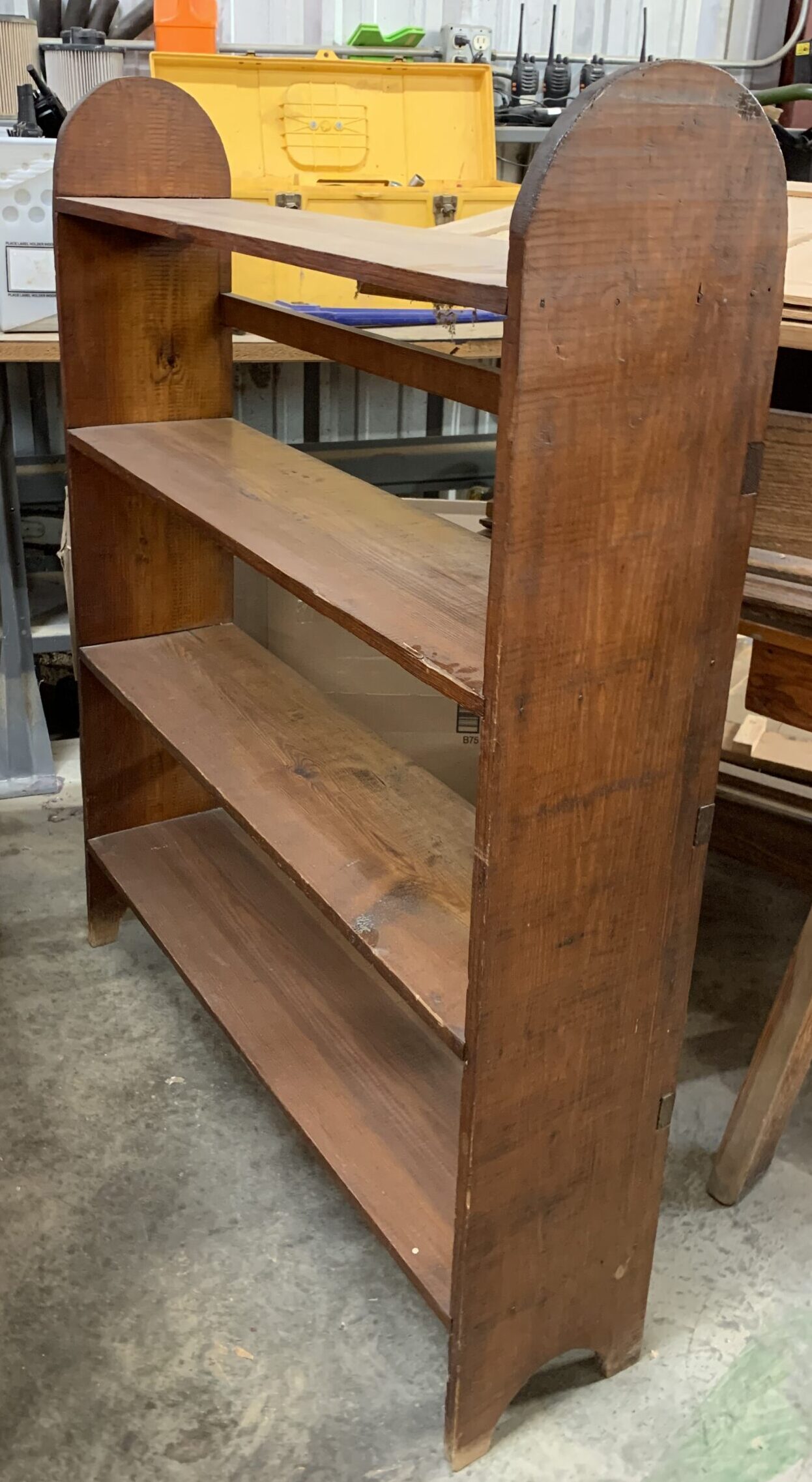 2024.25.1 simple wood four-shelf bookcase with rounded top on either end